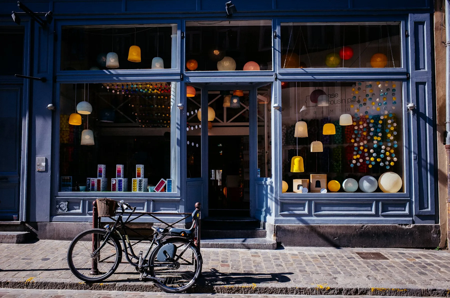 Independent shopfront with a bicycle parked outside